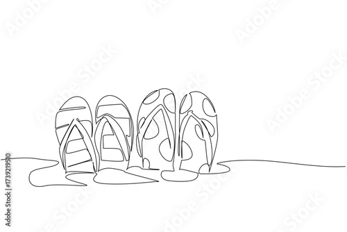 Continuous one line drawing 2 pairs of patterned flip flops embedded in the sand. A young couple spends their holidays on the beach. National Flip Flop Day. Single line draw design vector illustration