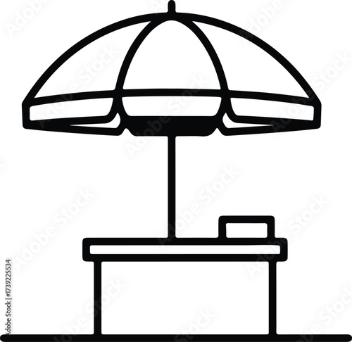 Vector silhouette of an umbrella and table illustration