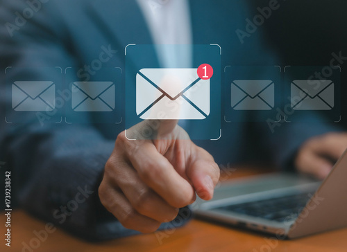 Businessman finger pressing digital email icon with notification alert, new message, online communication, inbox mail, business correspondence, marketing campaign, networking, technology 