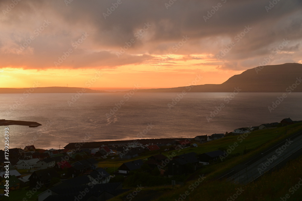 Obraz premium Golden Hour Over Torshavn and Surrounding Atlantic Waters, Faroe Islands
