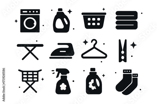 Laundry Icon Set. Laundry essentials. Solid icons set of laundry essentials: washing machine, detergent bottle, laundry basket, folded clothes, ironing board,