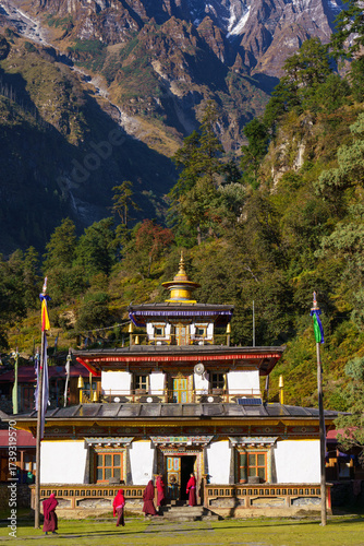 Monks gather at a colorful monastery in the mountains