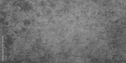 A rough, dark gray concrete wall texture creates a grunge vintage surface pattern