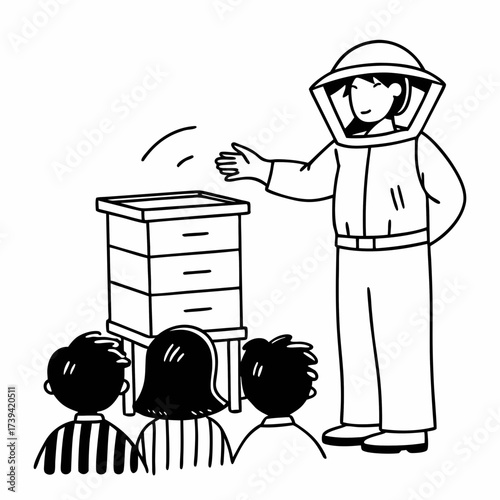 Beekeeper teaching children about beehives and beekeeping education