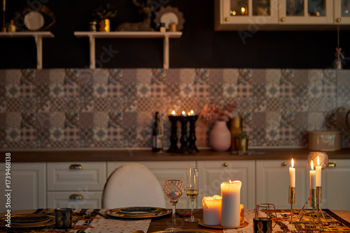 A beautifully arranged dining table adorned with flickering candles, creating a warm and inviting atmosphere for all