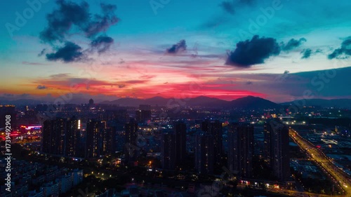 Wallpaper Mural Aerial City Skyline Sunset Timelapse Photography with Dramatic Evening Sky and Mountain Views Torontodigital.ca