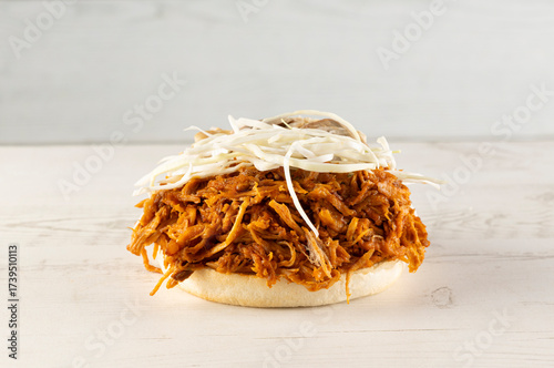 Pulled pork burger on a white background