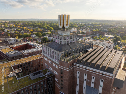 Dortmund U-Tower in Evening, Aerial Drone Shot. City skyline on the background in sunny day.