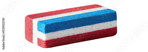 A close-up, rectangular object, with red, white, and blue layers, against a pure black background