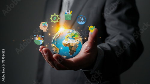 ESG concept. Businessman holding a globe with icons for environmental, social, and governance. Sustainable business, corporate social responsibility (CSR), and clean energy for the future.