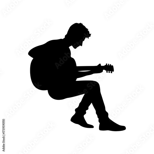 Silhouette of rock musician playing guitar