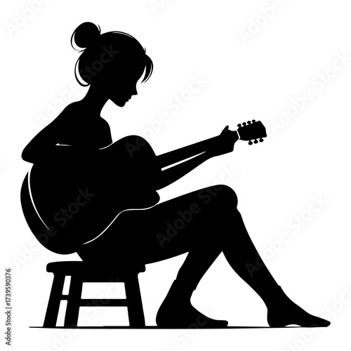 Silhouette of rock musician playing guitar