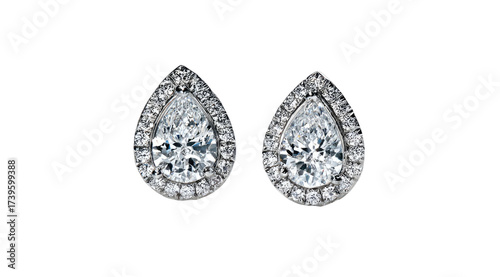 Two exquisite teardrop-shaped diamond earrings, haloed by smaller stones, set against a black background