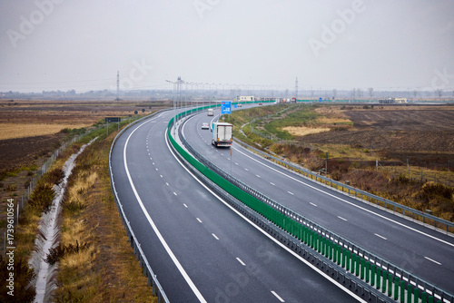 фотографія landscape with an expressway in Romania on a rainy autumn day