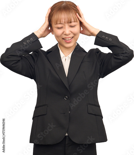 ビジネススーツを着た悩む女性