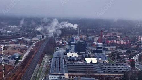 Wallpaper Mural Industrial landscape with smoking chimneys under overcast sky Torontodigital.ca