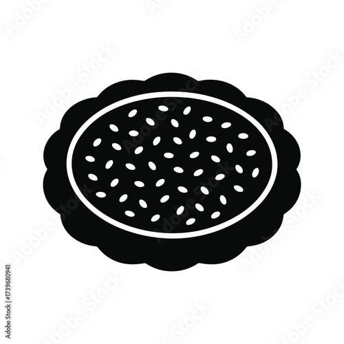 Silhouette of a seed cake or pastry.