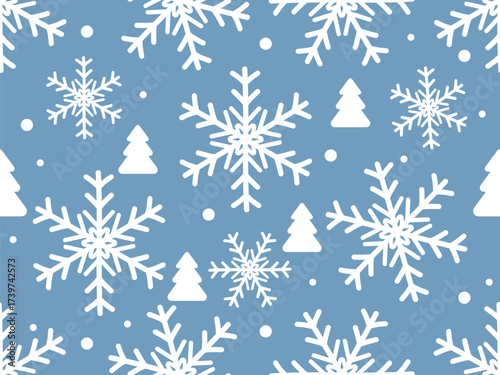 Seamless winter pattern with white snowflakes and fir trees on a light blue background Small white dots are scattered