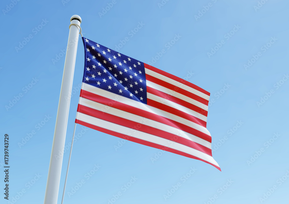 Fototapeta premium The national flag of the United States waving on a pole under a bright blue sky, symbolizing American freedom, unity, and patriotism. Ideal for editorial, cultural, and national holiday use