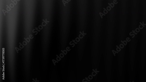 Blurry dark gradient ideal for backgrounds or design overlays, evoking a sense of shadowy depth or subtle fabric texture.