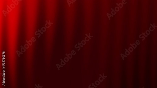 Deep red curtain with dark vertical folds is perfect for use in theater, interior design, event planning, and dramatic presentations.