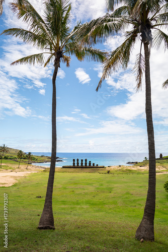 Bild auf Leinwand Beach with moais and palm trees at Easter Island, Rapa Nui, Pacific Ocean