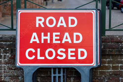 Red Sign Informing road ahead closed