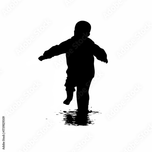 Silhouette of a boy splashing in a puddle isolated on white background