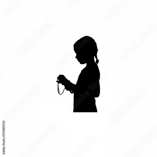 Silhouette of a girl braiding a friendship bracelet isolated on white background