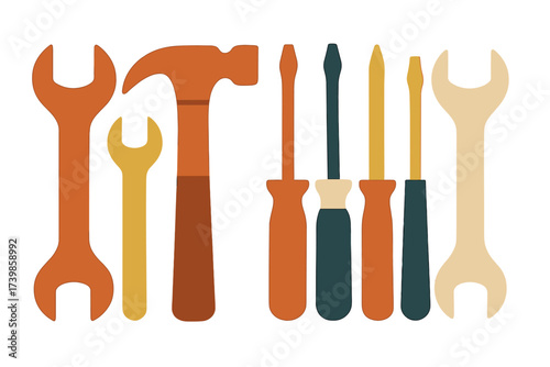 Assortment of essential repair and construction tools featuring hammer, adjustable wrenches, and various screwdrivers
