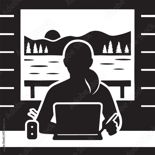 Silhouette of a person working on a laptop with a beautiful natural landscape visible through a window at sunset