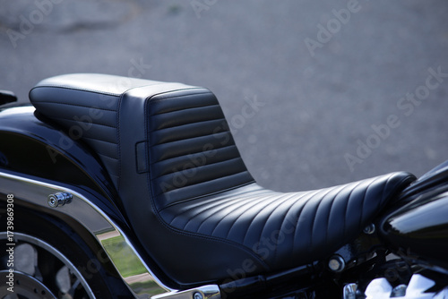 Motorcycle leather seat close-up.