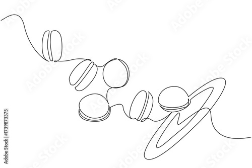Single one line drawing colorful macarons flying off the plate. Sweet snacks are in high demand. Very creative visualization. Tasty. National Macaron Day. Continuous line design graphic illustration
