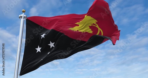 Papua New Guinea flag with flagpole waving in wind, rolling clouds background looping, 4K video (Perfect Loop)