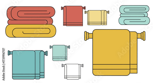 Colorful bath towels set folded and on hangers isolated on white.