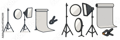 Professional photography studio equipment set with various lighting, reflectors, backdrop, and clamps for creative projects