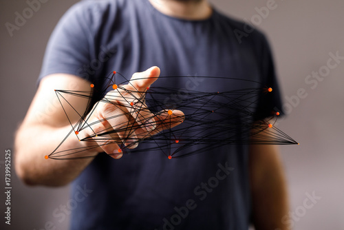 Close-up of a man's hand re...