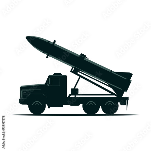 Silhouette of a military truck carrying a large missile