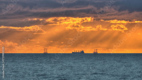 Offshore Oil rigs at Sunrise on the Texas coast