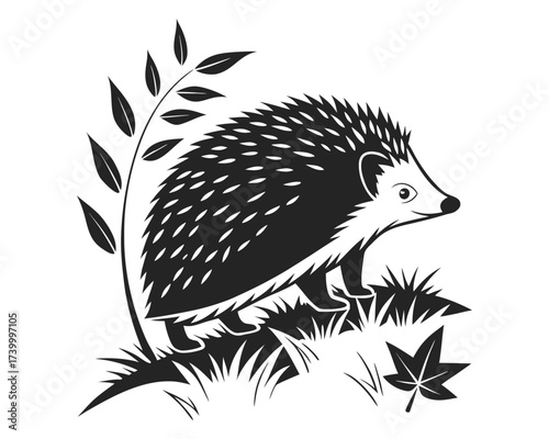 A black and white linocut style illustration of a hedgehog standing in grass with leaves and branches nearby