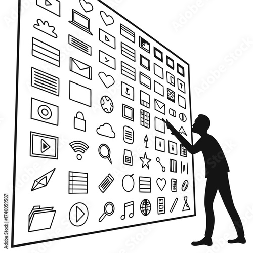 Person interacting with large icon wall