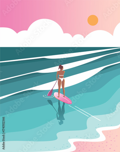 Paddleboarder enjoying a beautiful sunrise over the ocean