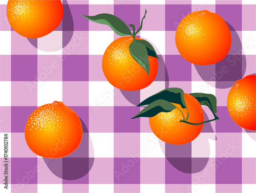 Oranges on plaid pattern tablecloth