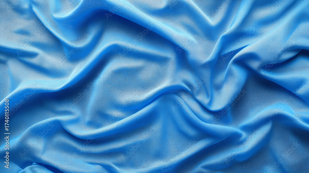 Obraz premium Blue sports clothing fabric texture inspired by football shirt jersey material symbolizing performance energy and teamwork representing breathable athletic design and modern sports apparel