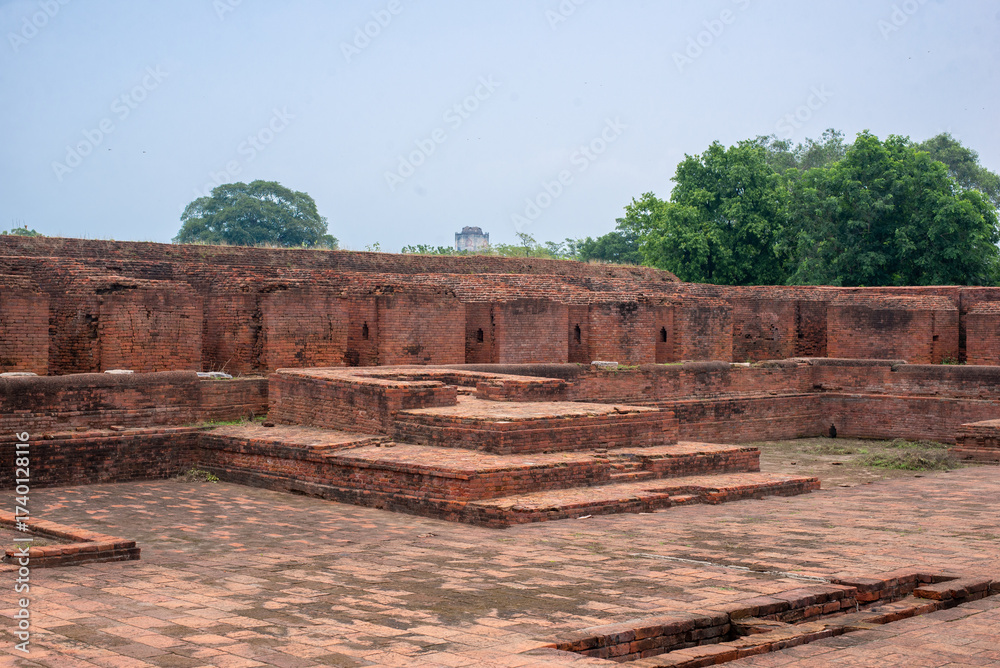 Fototapeta premium The ruins of Nalanda University in Bihar are a UNESCO World Heritage Site, once a great center of learning (5th–12th century). Its red-brick monasteries, temples, and libraries reflect India’s ancient