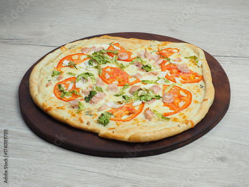 A full pizza against a light background, at a 45-degree angle.