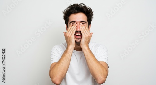 Man rubbing eyes showing exhaustion stress or eye strain isolated on transparent background