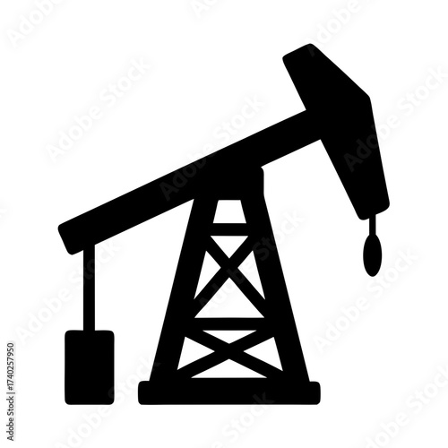 Silhouette of an oil pump jack extracting crude oil from the earth