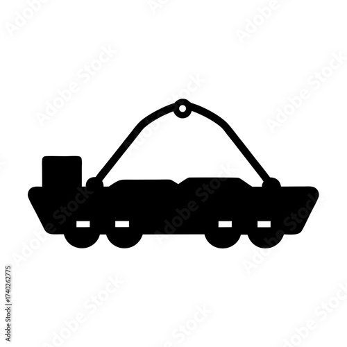 Black silhouette of a suspended train car, used for mining coal