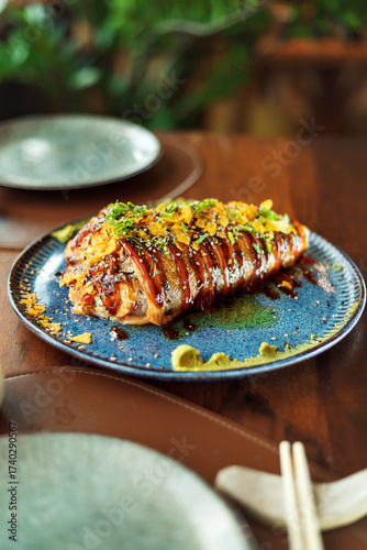 dish with stuffed salmon, oriental cuisine, Asian food